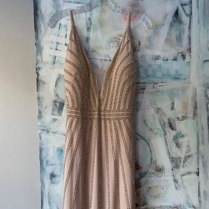 Gorgeous blush pink gown with gold beads.